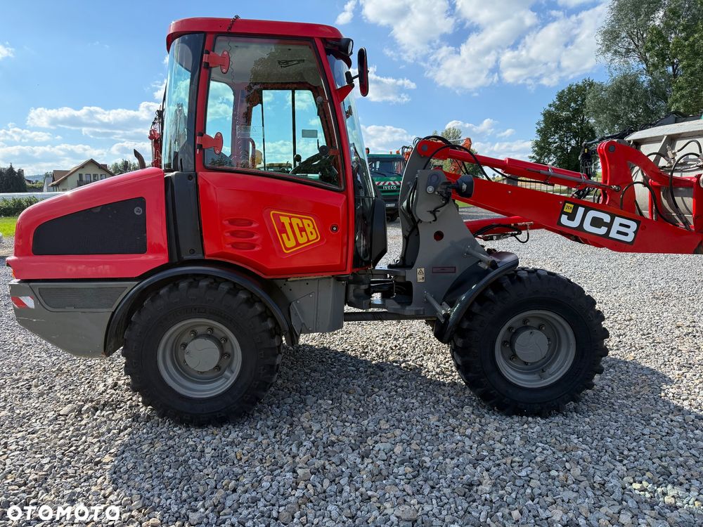 JCB 406 - 7