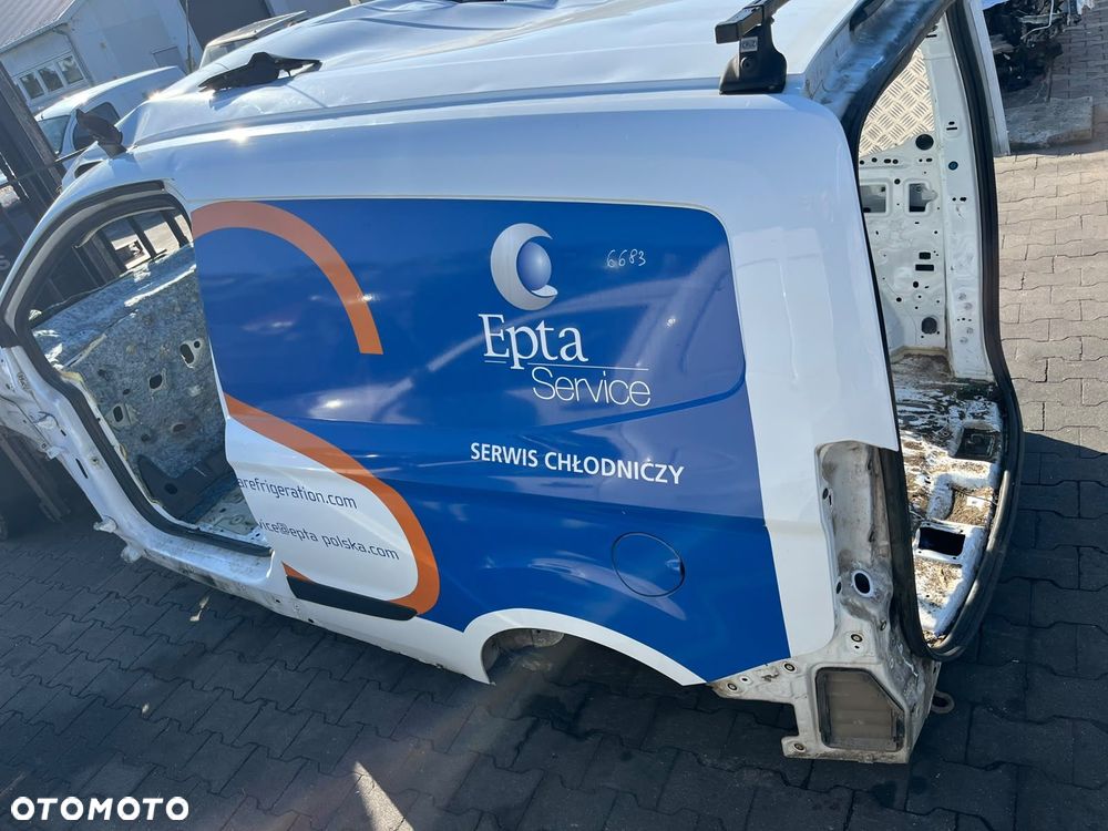 BŁOTNIK TYŁ LEWY ĆWIARTKA FORD TRANSIT COURIER B460 - 1