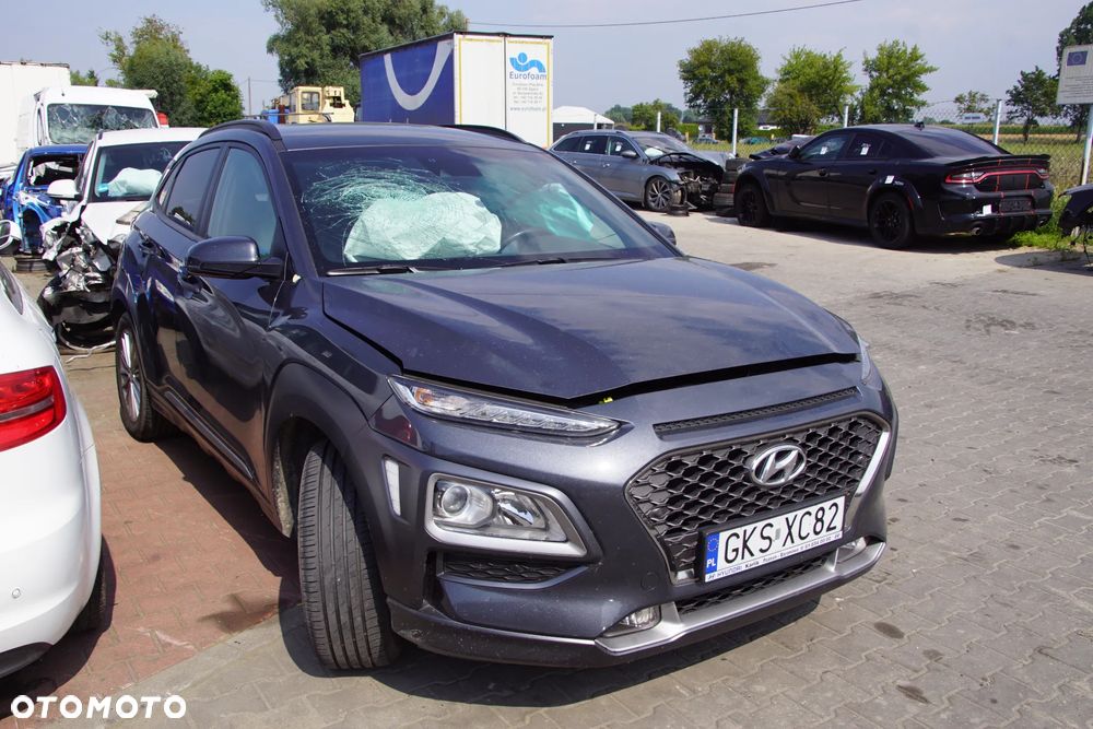 Auto na części - Hyundai Kona I 1.6 T-GDI 177 KM G4FJ D7UF1 YG7 2019R Silnik Skrzynia Drzwi Maska Błotnik Zderzak Klapa Lampa Lusterko Klamka Szyba Deska Kokpit Sterownik Moduł Czujnik Licznik Wyświetlacz Panel Kierownica - 7