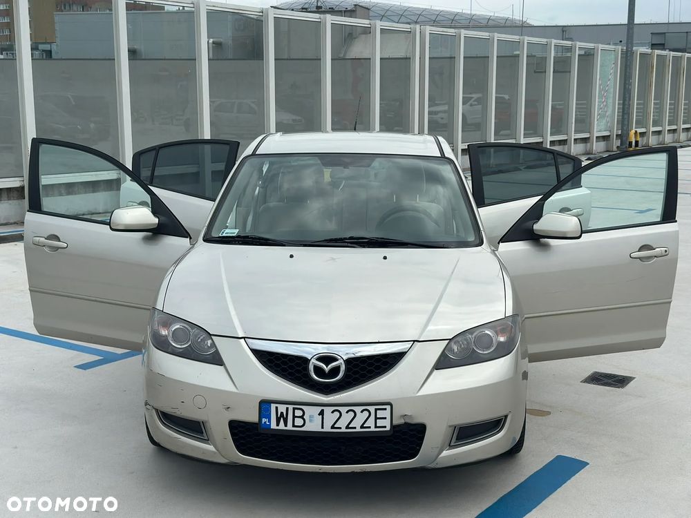 Mazda 3 2.0 Exclusive + - 9