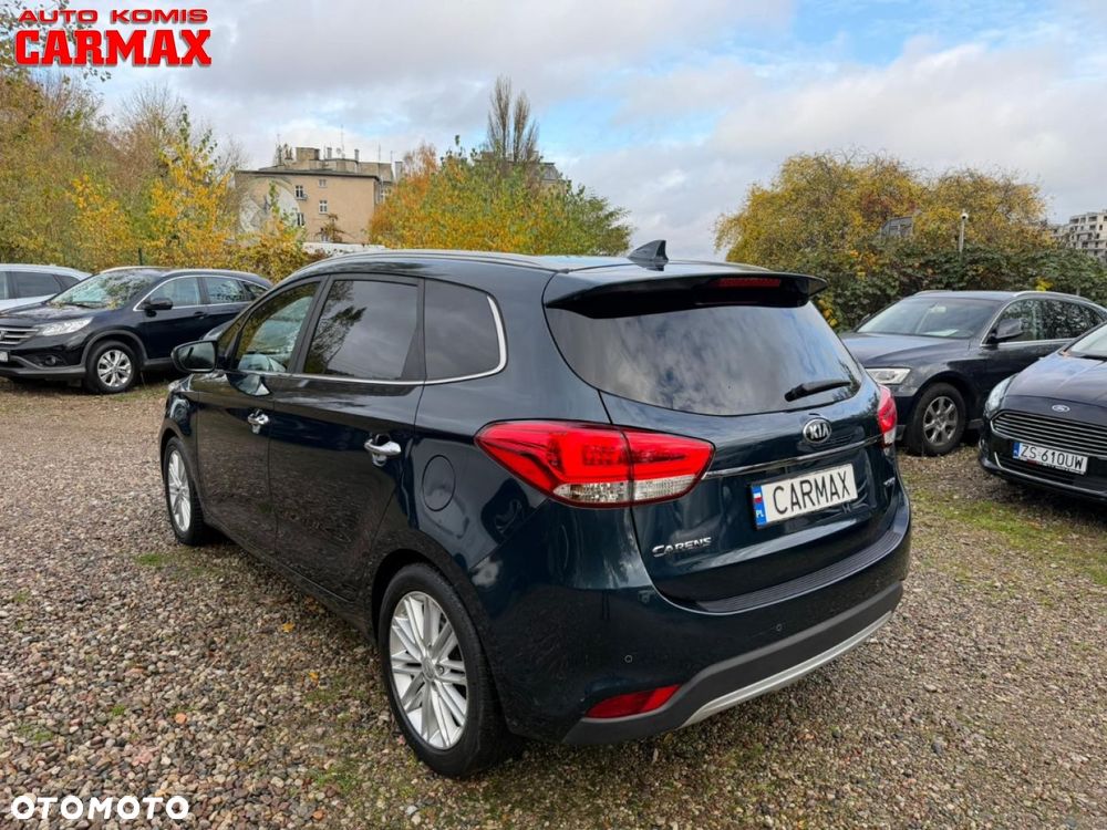 Kia Carens - 4