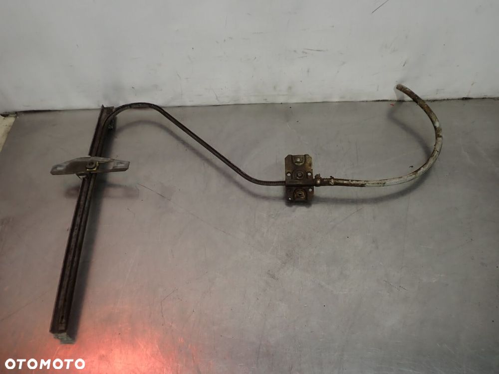 PODNOŚNIK SZYB PRAWY PRZÓD VOLKSWAGEN T3 - 4