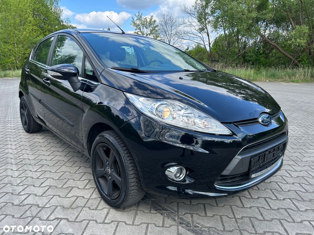 Ford Fiesta 1.4 Ghia - 4
