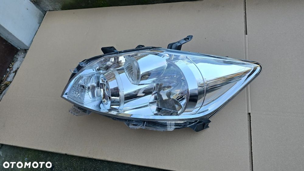 Toyota Auris I Lift 10-12 Lampa Przód Lewa Zwykła Soczewka Oryginał EU Nieklejona - 2