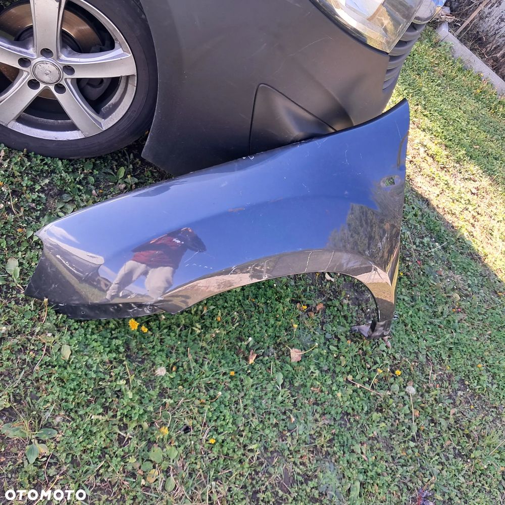 Błotnik lewy przód Dacia Duster 10 -17 przedni OE oryginał