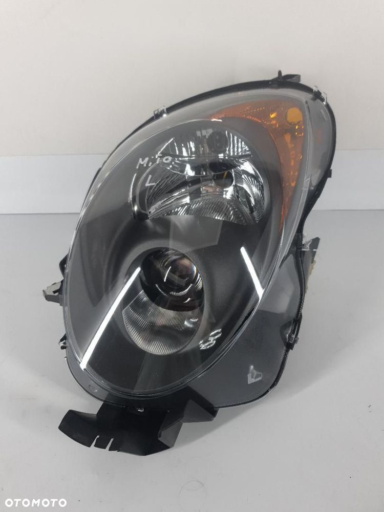 NOWY DEPO LAMPA REFLEKTOR LEWY ALFA ROMEO MITO 6671117LM - 1