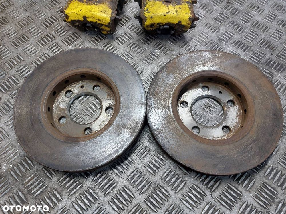 TARCZE HAMULCOWE PRZÓD + KLOCKI + ZACISKI SEAT LEON I GOLF IV 1.4 16V - 2