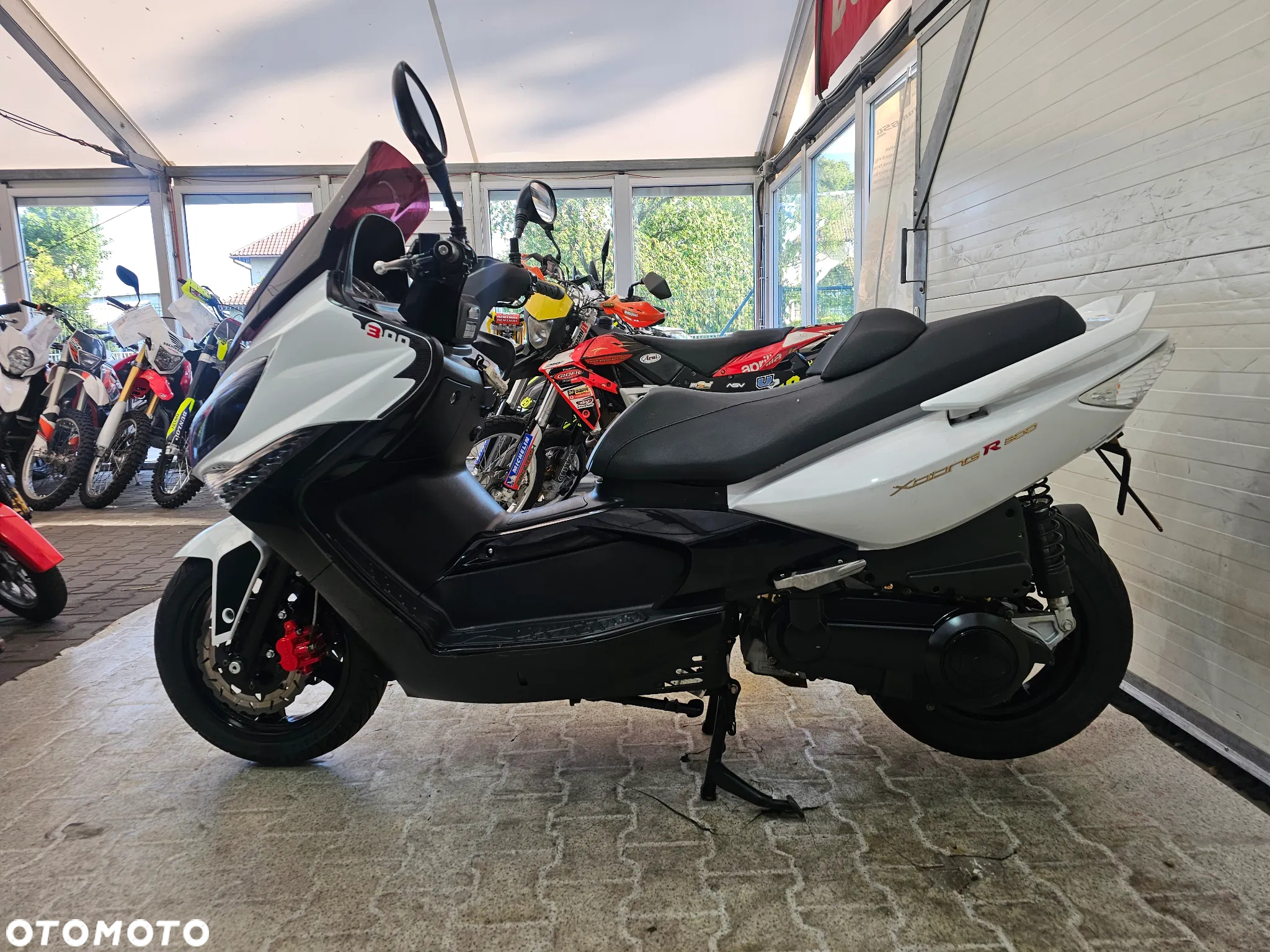 Kymco Xciting - 12