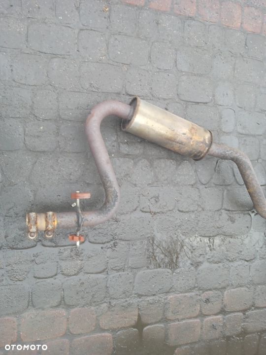 WYDECH TŁUMNIK VOLKSWAGEN GOLF V 3D - 2