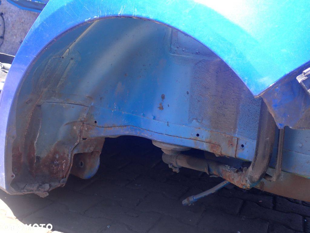 SUZUKI SWIFT MK6 III BŁOTNIK TYŁ LEWY  ZCG - 2