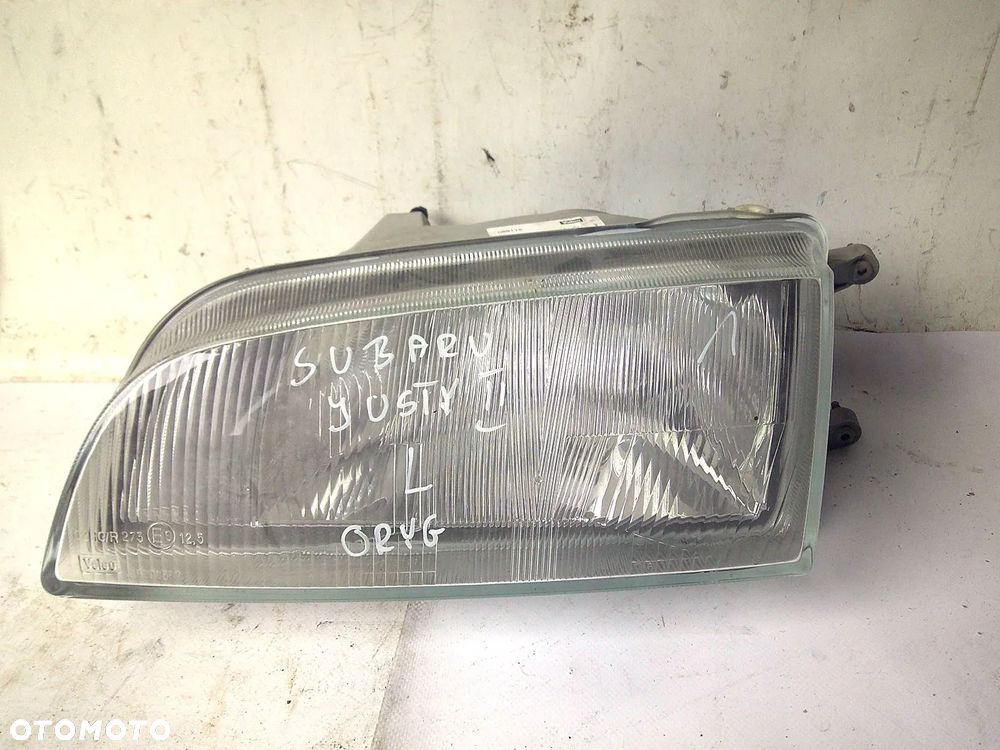 subaru justy ii lampa przód lewa przednia suzuki swift ii - 1
