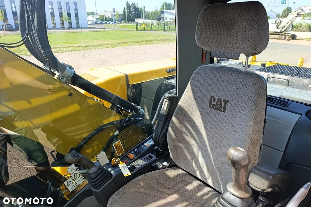 Caterpillar M318D - 13