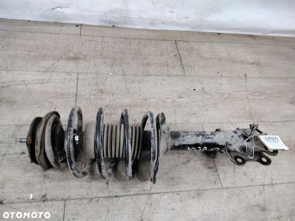 nissan almera n16 mcperson lewy - 1