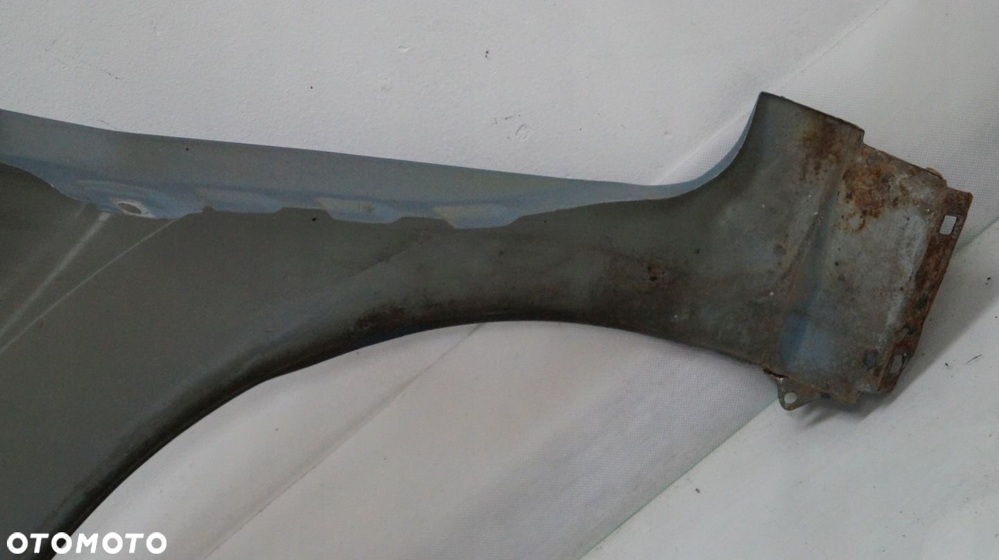 BŁOTNIK PRZEDNI PRAWY FORD FIESTA MK7 79 - 12