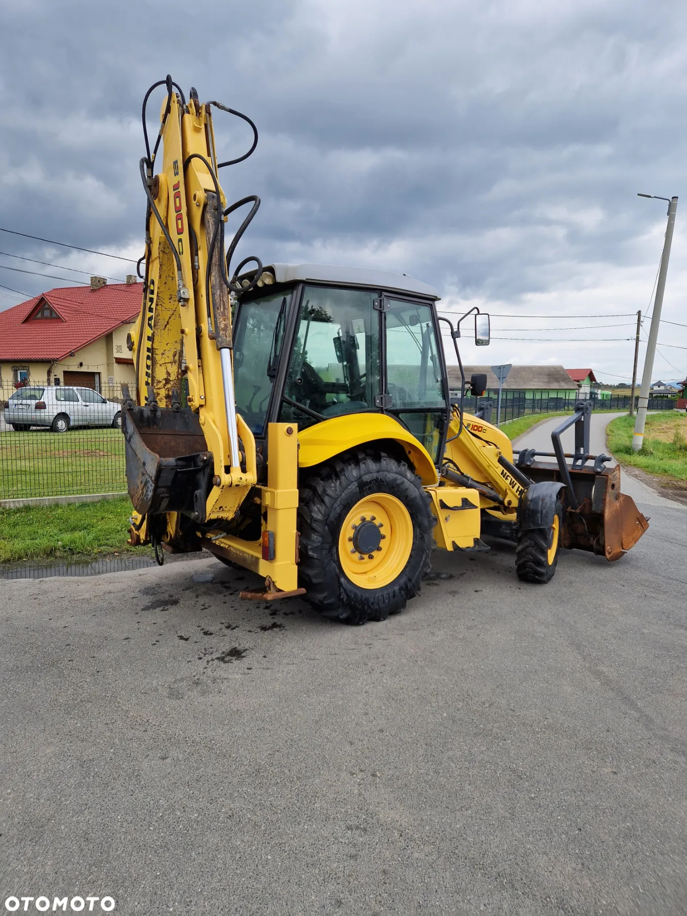 New Holland B100C - 6