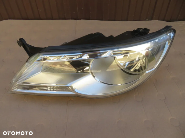 REFLEKTOR LEWY VW TIGUAN I 5N 07-10 5N1941031AB DEMONTAŻ KRAKÓW