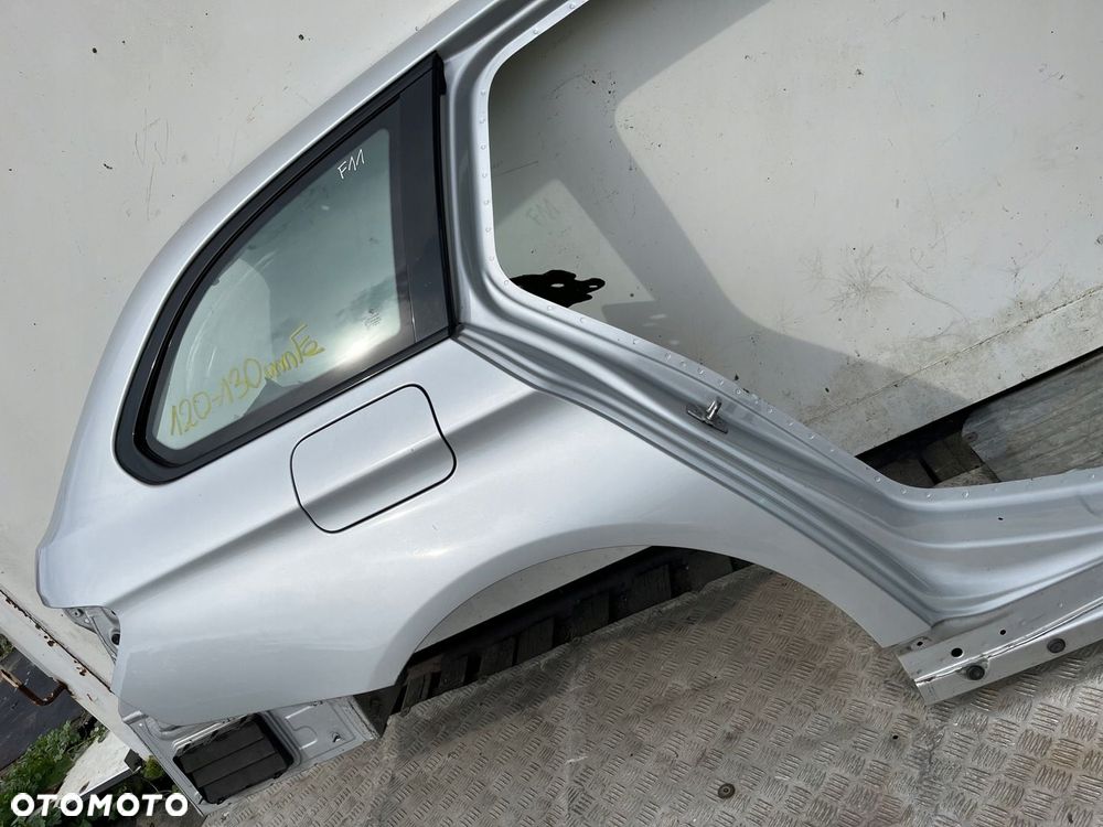 Blotnik cwiartka szyba poszycie prawy tyl BMW F11 354 120-130 umFe LADNY - 2