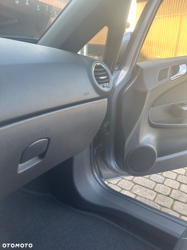 Opel Corsa 1.2 16V Enjoy - 21