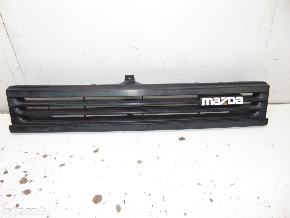 Mazda 323 1988 grelha - 1