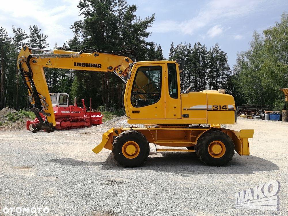 Liebherr A 314 Litronic - 2
