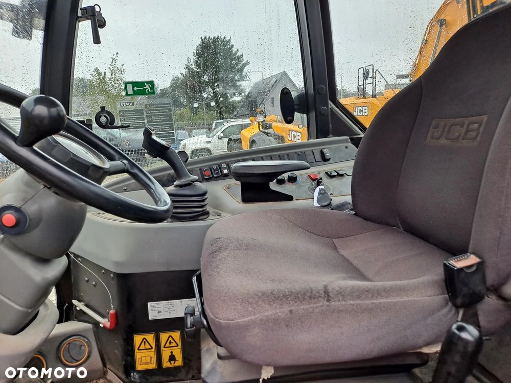 JCB 406 - 9
