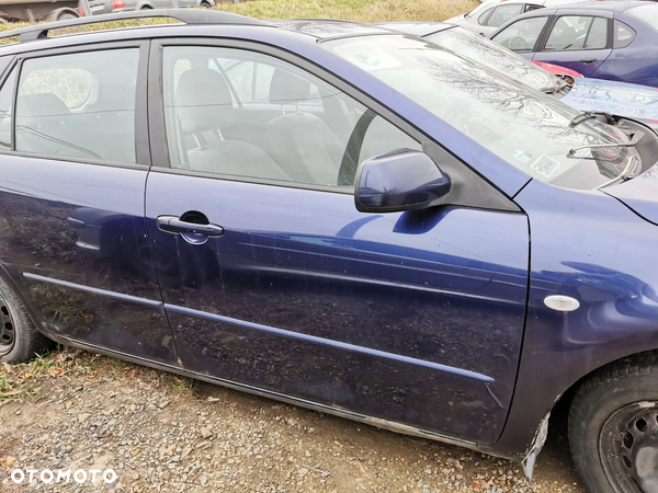 Drzwi przód, tył Mazda 6 I 2003r.