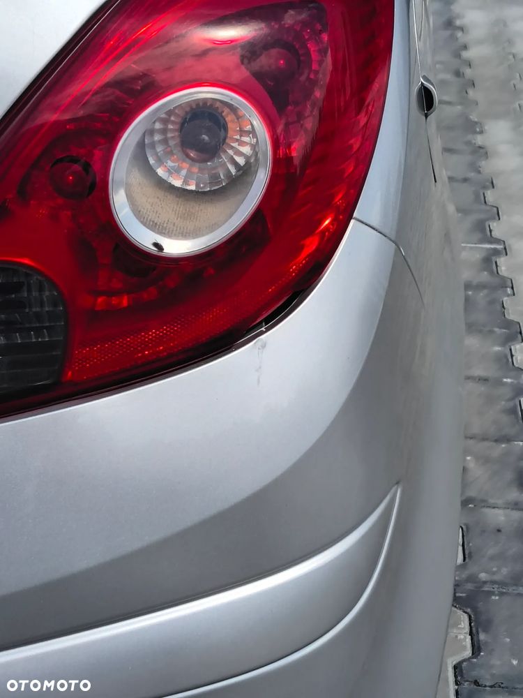 Opel Corsa 1.4 16V Cosmo - 12