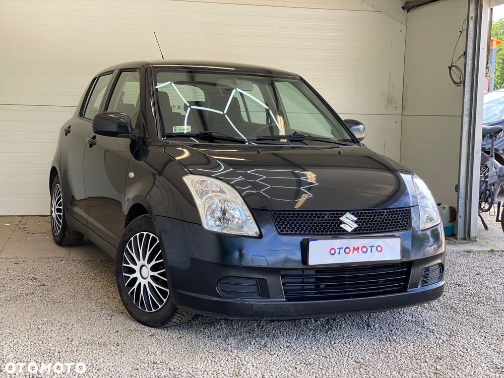 Suzuki Swift 1.3 Club - 32