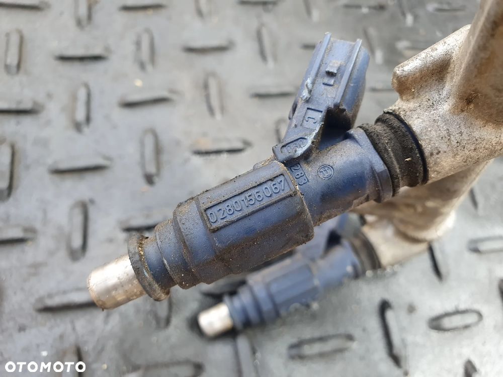 TOYOTA YARIS I 1.0 LISTWA WTRYSKOWA WTRYSKI KOMPLET 4 SZT 23250-0J010 0280156067 POSIADAM 5 SZT - 6