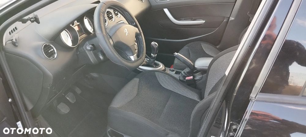Peugeot 308 1.6 HDi Trendy Navtech - 14