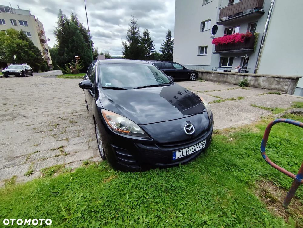 Mazda 3 1.6 Exclusive - 2