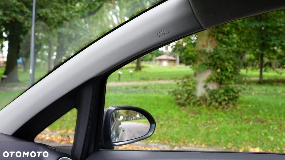 Opel Corsa 1.2 16V Cosmo - 5