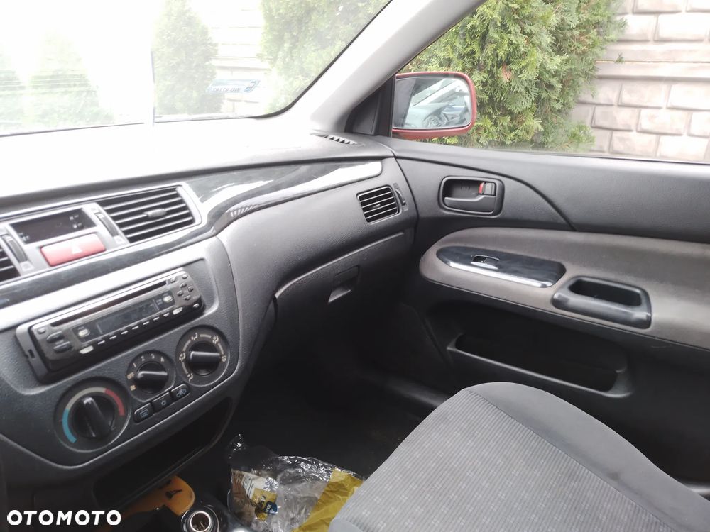 MITSUBISHI LANCER VII KOMBI 1.6 16V 03 - 08  OSŁONA PRZECIWSŁONECZNA PRAWA LEWA - 34