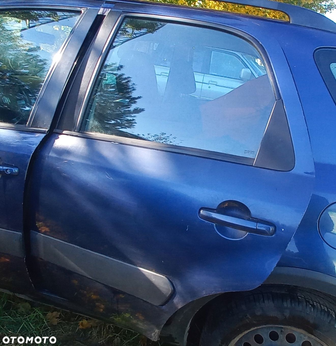 DRZWI TYLNE LEWE SUZUKI SX4 ZCH - 1