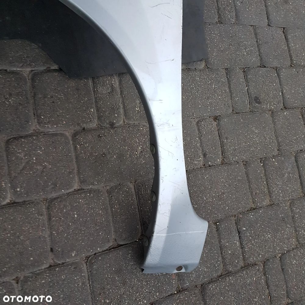 błotnik nissan micra k12 lewy oryginal - 12