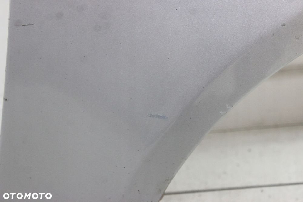 MITSUBISHI LANCER VIII 07R- BŁOTNIK PRAWY PRZÓD PRZEDNI A31B - 12