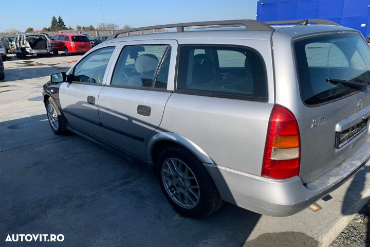 Vas expansiune Opel Astra G  [din 1998 pana  2009] seria wagon 5-usi 1.7 DTi AT (75 hp) - 3