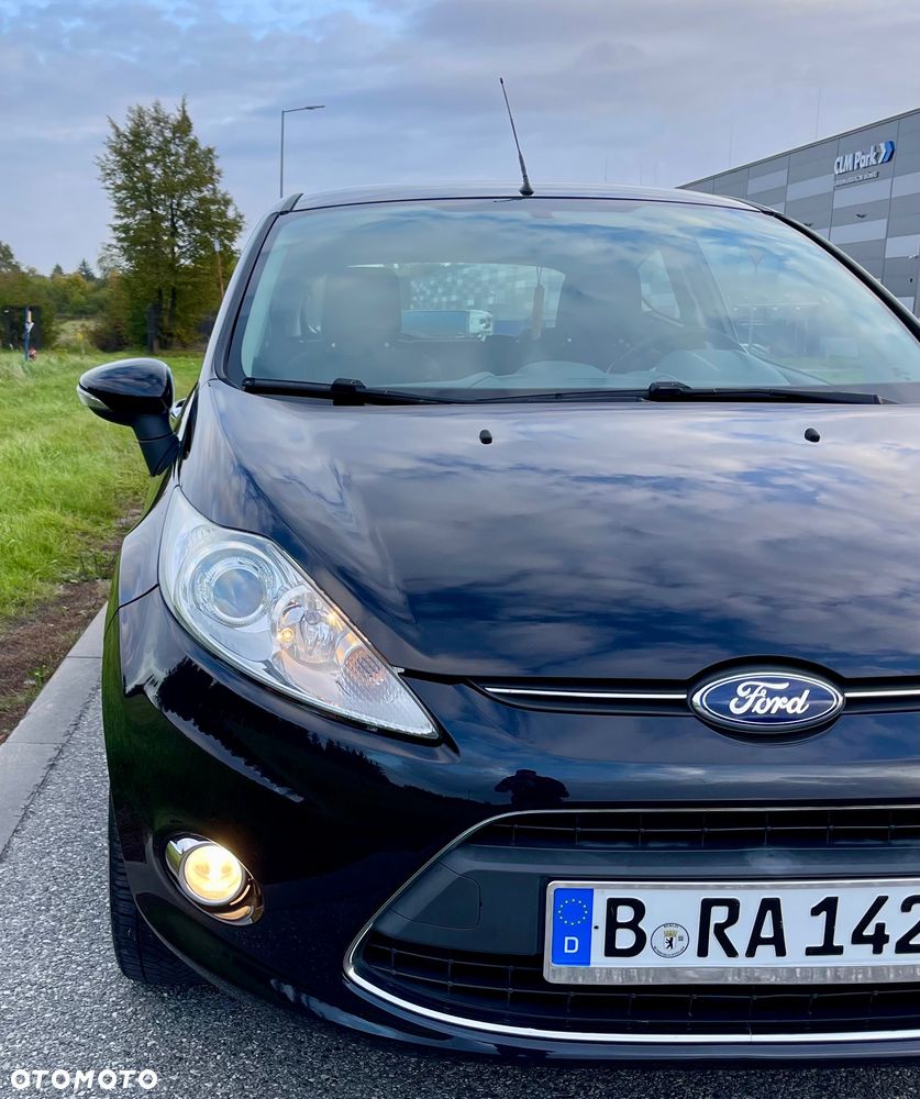 Ford Fiesta 1.25 Ghia - 23