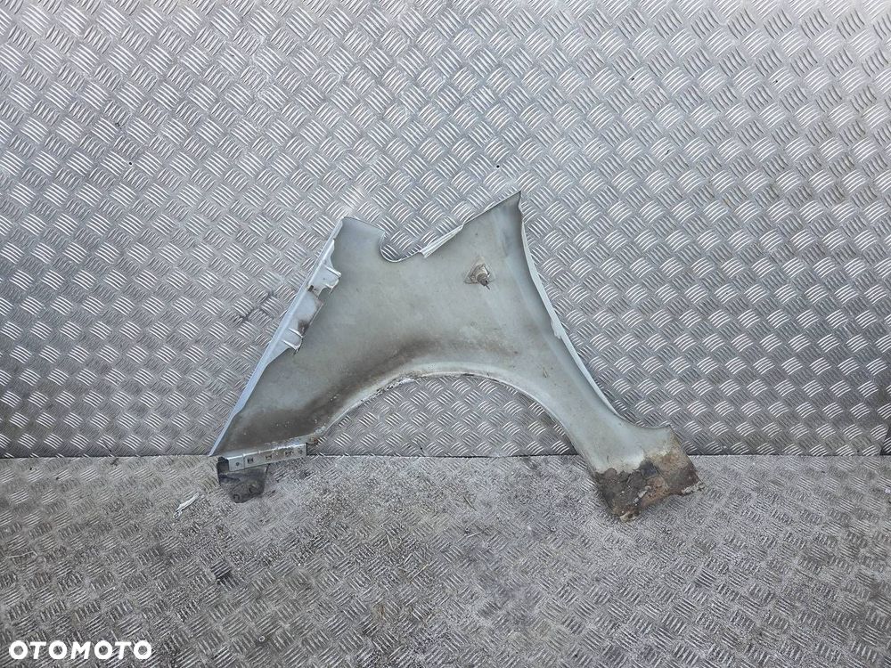 BŁOTNIK PRAWY PRZEDNI MITSUBISHI COLT - 2