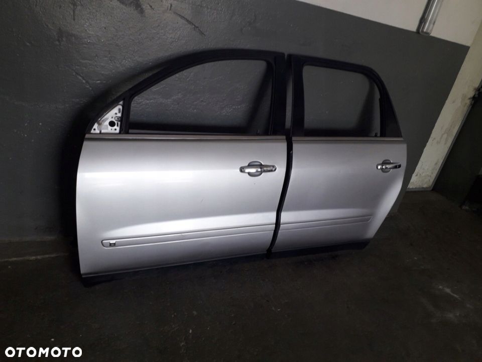 Saturn Outlook klapa lampy tył, drzwi