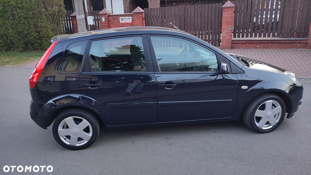 Ford Fiesta 1.4 Ghia - 11