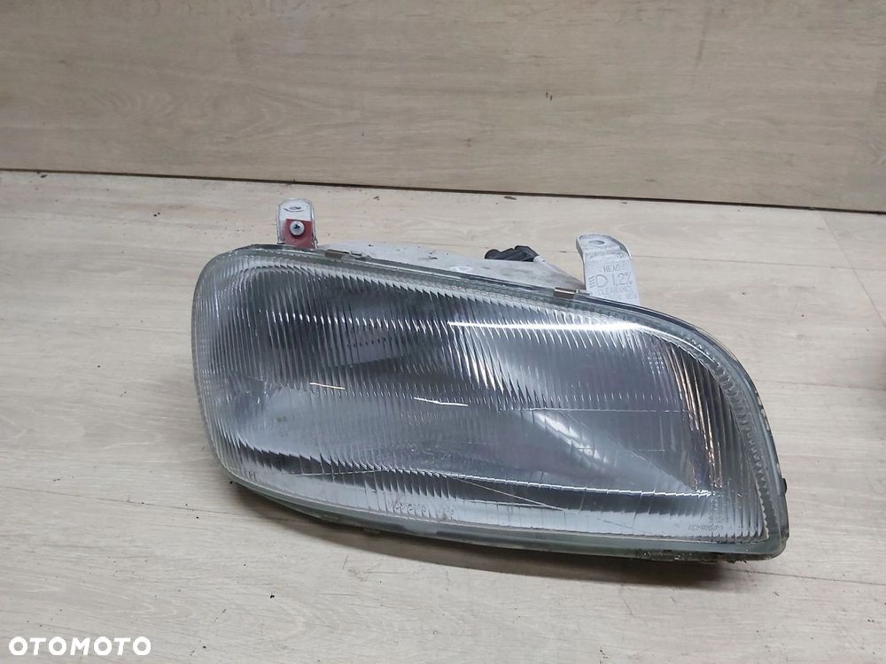 Toyota RAV4 I XA10 lampa lewy przód KLOSZ - 1