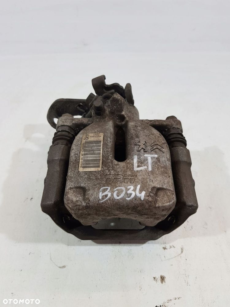 zacisk hamulcowy lewy tył 9819337680 opel combo e berlingo iv 21r 1.5d - 2