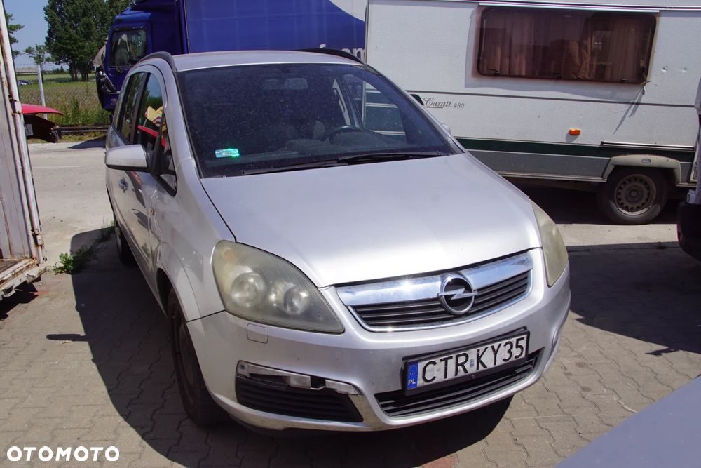 Auto na części - Opel Zafira B 1.8 16V 140 KM Z18XER F17 Z157 2006R Silnik Skrzynia Drzwi Maska Błotnik Zderzak Klapa Lampa Lusterko Klamka Szyba Deska Kokpit Sterownik Moduł Czujnik Licznik Wyświetlacz Panel Kierownica - 7