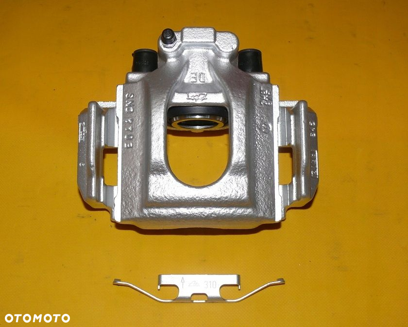 ZACISKI LEWY PRAWY PRZÓD TYŁ VW T5 308/29,5 314/22 - 10