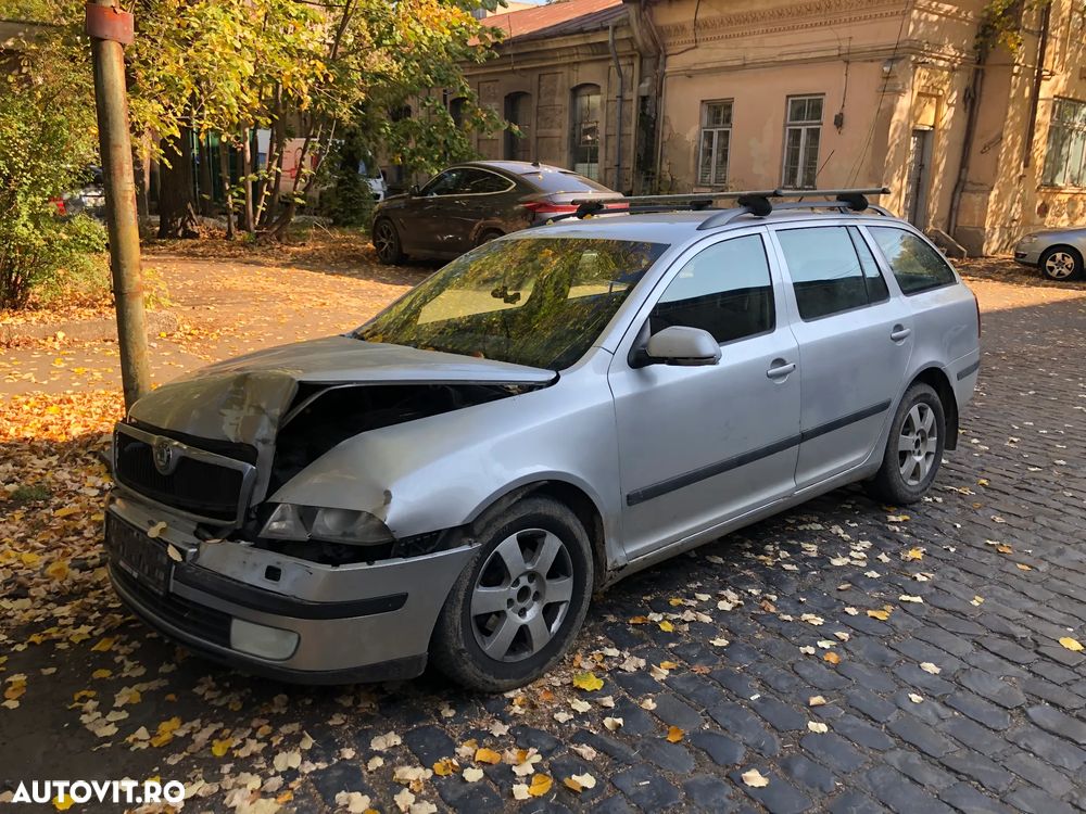 Dezmembrez Skoda Octavia II break 2006 gri argintiu 1,9TDI cod BXE