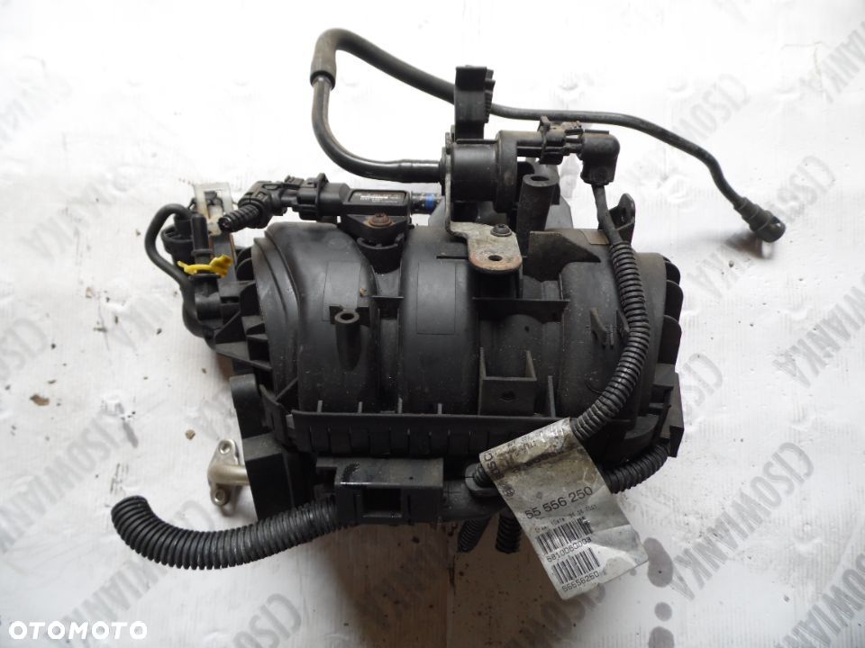 Kolektor ssący Opel Corsa D 55557905 - 1