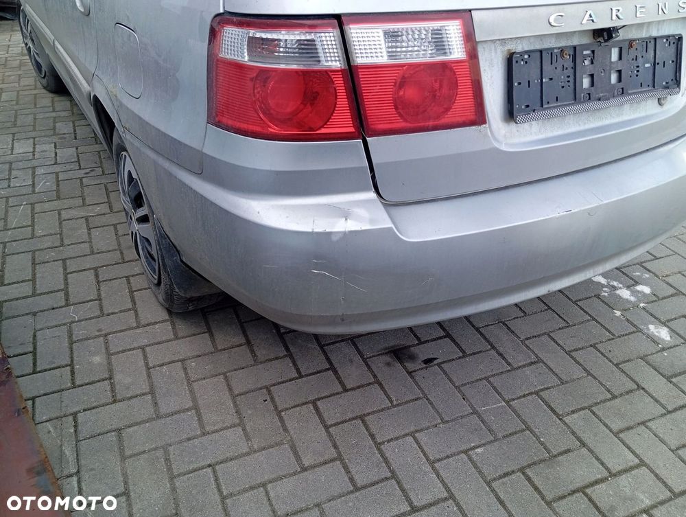KIA CARENS II ZDERZAK TYLNY TYŁ C5 - 2