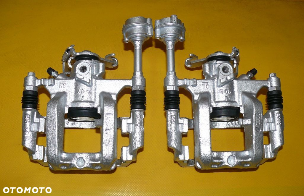 ZACISKI HAMULCOWE JARZMA LEWY PRAWY TYŁ OPEL ASTRA 4 IV J 292/12mm - 1