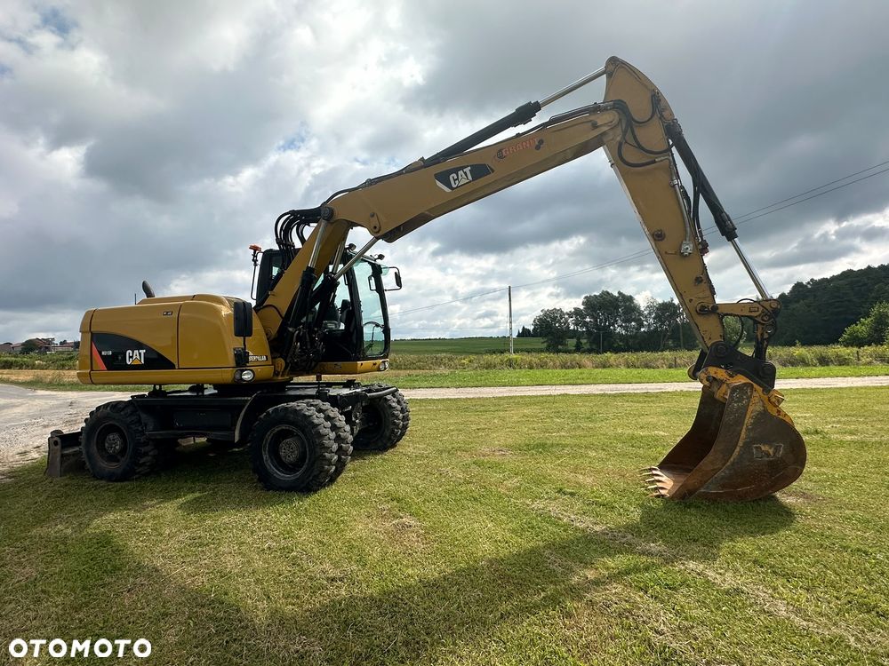 Caterpillar M313D - 1